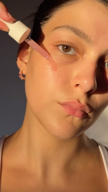 PURESKIN reel: applying PDRN peptide face serum with the dropper